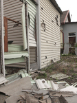 Downed missile debris fall on private houses in Dnipro.