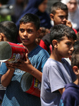 Palestinians Receive Food Rations