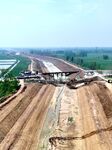  Workers Reinforce Embankments in Suqian.