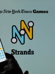 NYT Strands Game - Photo Illustration