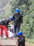 Reconstruction After Flood in Guangxi.