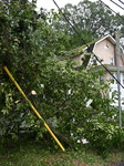 Severe Weather Causes Tree To Damage Home And A Fence With Power Lines Destroyed In Hillsdale New Jersey