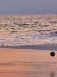 Youth Play A Game Of Football By The Ocean At Sunset In Paruthiyoor