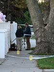 Crime Scene Investigators At The Scene Where Three People Were Shot At 132-45 220th Street In Queens New York