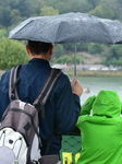 People With Umbrellas In The Lyon Kayak