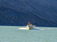 Police Patrol Kanas Lake by Boat in Altay,