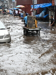 Waterlogged Streets Caused Heavy Rainfall In Dhaka.