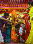 Devotees Performing Nabapatrika Ritual On The Occasion Of The Durga Puja Festival In Kolkata, India