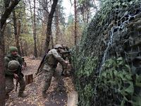 Ukrainian artillery crew at positions in Kharkiv region.