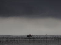 Rain Clouds Gather Over A Cottage In Chonburi