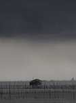 Rain Clouds Gather Over A Cottage In Chonburi