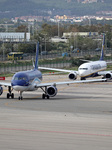 Diverse Aircraft On The Takeoff Runeway