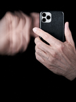 Social Addiction. Hand Swiping On Smartphone Screen With Motion Blur Effect