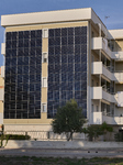 Photovoltaic Facade On Residential Building In Margherita Di Savoia, Italy