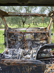 Burnt-Out Stolen Car In The Countryside Of Cerignola