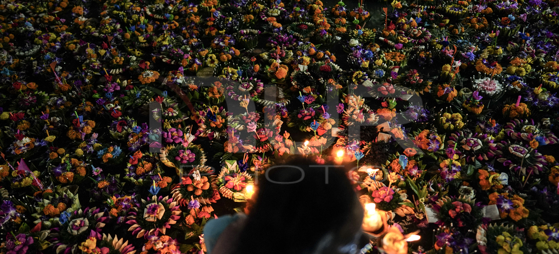 People float Krathong offerings at a park lake during the Thai annual Loy Krathong festival in Bangkok, Thailand, on November 15, 2024. The...