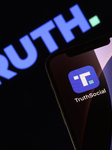 Truth Social App Displayed On IPhone With Logo In Background