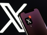 X App Icon On IPhone With Logo In Background