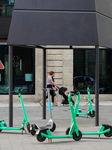 Rental E-scooters Parked In A Pedestrian Zone In Hamburg