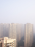 Buildings Loom in the Morning Fog in Ningbo.