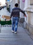 Asian Workers Transporting Goods In Dresden