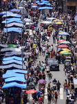 Consumers Are Busy Shopping For Christmas At Ladeira Porto Geral In SP