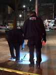 NYPD Evidence Collection Team Gathers Evidence Where Two People Were Shot At NYCHA Housing Complex In Bedford Stuyvesant Brooklyn New York