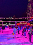 Ice Skating Under Festive Lights