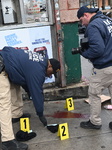 NYPD Crime Scene Investigators At The Scene Of 34-year-old Man Fatally Stabbed Outside Of Mucho Lucio Deli Grocery On Sutter Avenue In Brownsville Brooklyn New York