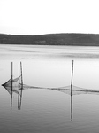 Fishing Nets Reflected On Calm Varano Lake