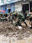 Soldiers Removes Slush From Streets In Jingxing, China