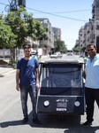 A Solar Car Made By Two Palestinian Students On The Streets Of Gaza