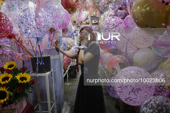 A balloon vendor inside the Jamaica Market in Mexico City where dozens of people came to buy flowers and gifts for Mother's Day, which is ce...