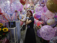 A balloon vendor inside the Jamaica Market in Mexico City where dozens of people came to buy flowers and gifts for Mother's Day, which is ce...