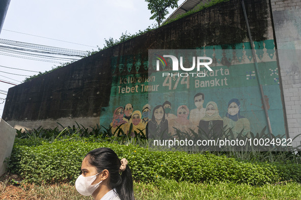 A mural promoting awareness of the coronavirus disease (Covid-19) are seen in Jakarta, Indonesia, on May 09, 2023. The World Health Organiza...