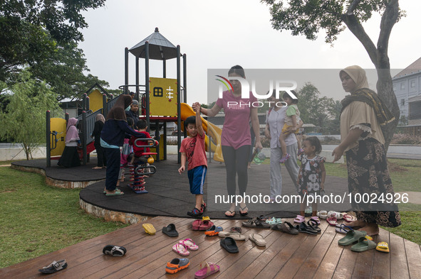 JAKARTA, INDONESIA - MAY 09 : Children playing without wearing a mask at public park in Jakarta, Indonesia, on May 09, 2023. The World Healt...