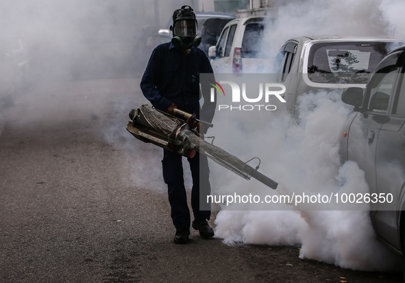 A health worker uses an anti-mosquito fumigation machine to control mosquitoes in Colombo, Sri Lanka. May 10, 2023. The dangerous dengue vir...