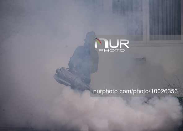 A health worker uses an anti-mosquito fumigation machine to control mosquitoes in Colombo, Sri Lanka. May 10, 2023. The dangerous dengue vir...