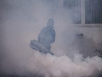 A health worker uses an anti-mosquito fumigation machine to control mosquitoes in Colombo, Sri Lanka. May 10, 2023. The dangerous dengue vir...