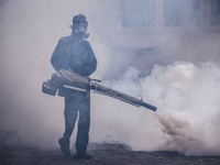 A health worker uses an anti-mosquito fumigation machine to control mosquitoes in Colombo, Sri Lanka. May 10, 2023. The dangerous dengue vir...