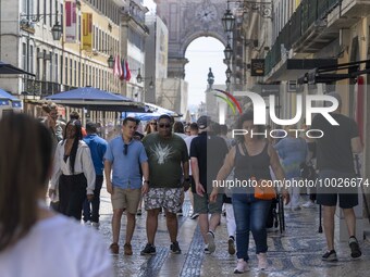 People are seen walking in Da Prata street, in the neighborhood of Baixa, Lisbon. 02 May 2023. (