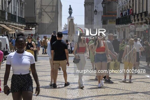 People are seen walking in Da Prata street, in the neighborhood of Baixa, Lisbon. 02 May 2023. 