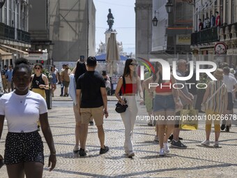 People are seen walking in Da Prata street, in the neighborhood of Baixa, Lisbon. 02 May 2023. (