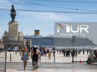 People are seen walking around the area around the Praca de Comercio in the Baixa neighborhood. 02 May 2023.  (