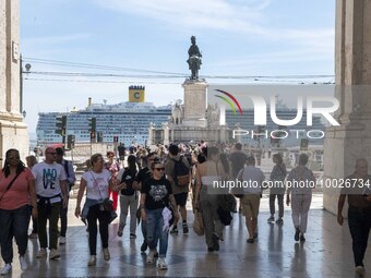 People are seen walking around the area around the Praca de Comercio in the Baixa neighborhood. 02 May 2023.  (