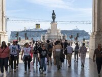 People are seen walking around the area around the Praca de Comercio in the Baixa neighborhood. 02 May 2023.  (