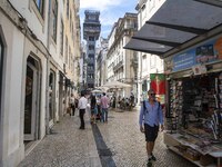 People are seen walking in Da Prata street, in the neighborhood of Baixa, Lisbon. 02 May 2023. (