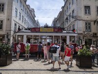 People are seen walking in Da Prata street, in the neighborhood of Baixa, Lisbon. 02 May 2023. (