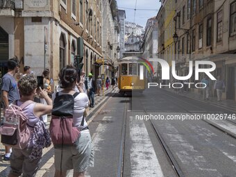 A Tram is seen passing through one of the streets in the neighborhood of Baixa, Lisbon. May 02, 2023. (