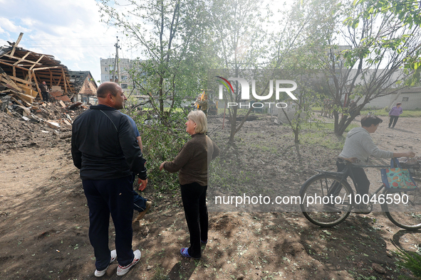 ZOLOCHIV, UKRAINE - MAY 14, 2023 - People are seen outdoors after the rocket attack by Russia that, allegedly, used S-300 surface-to-air mis...